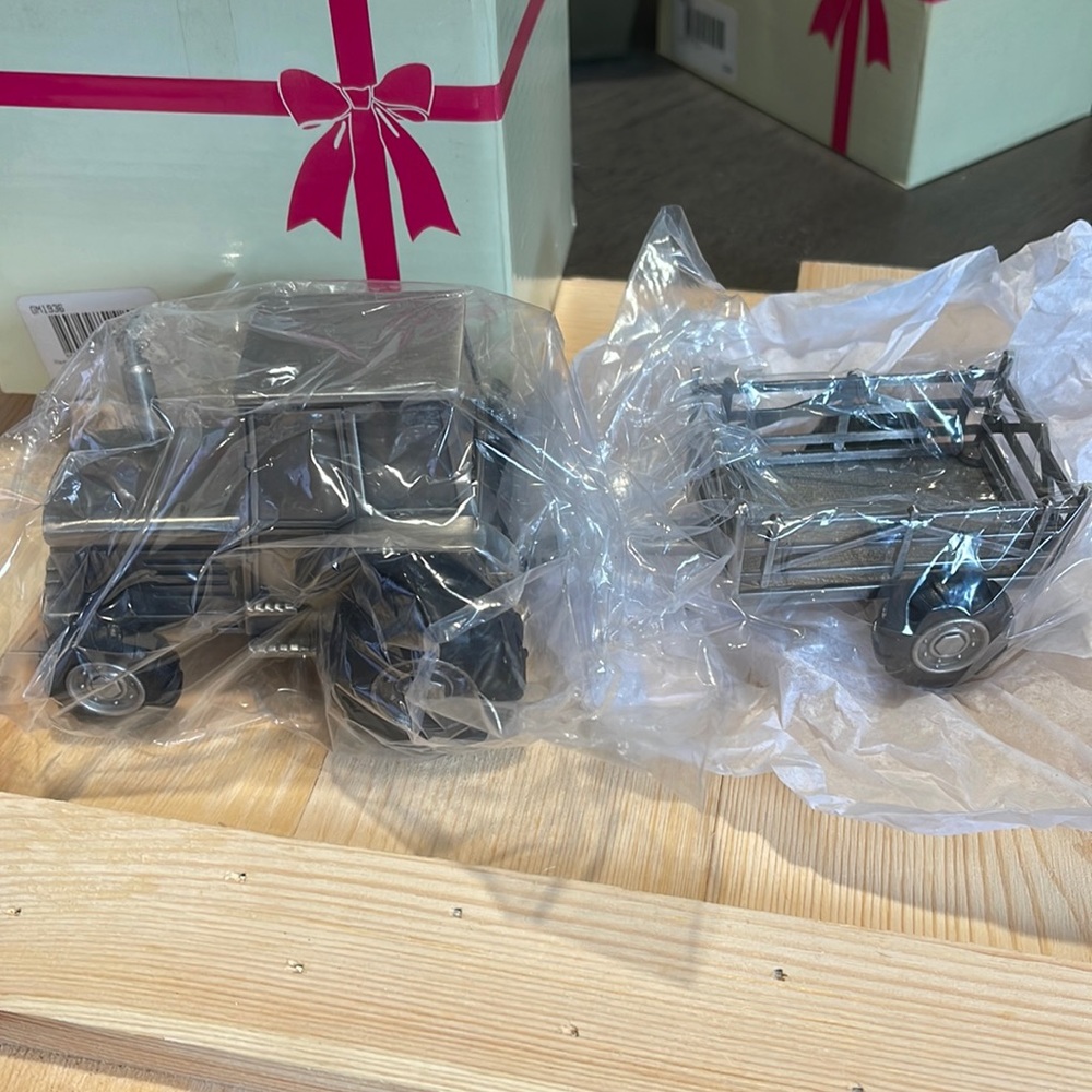 Brand new pewter farm tractor bank for kids. Still in original box.